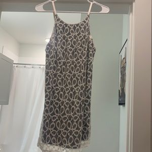 Super cute white strappy dress.